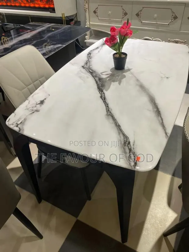 An Eye Catching 4 Seater Marble Dining · Photo 1
