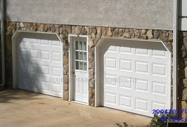 Canadian Standard Automatic Garage With Remote System · Photo 1