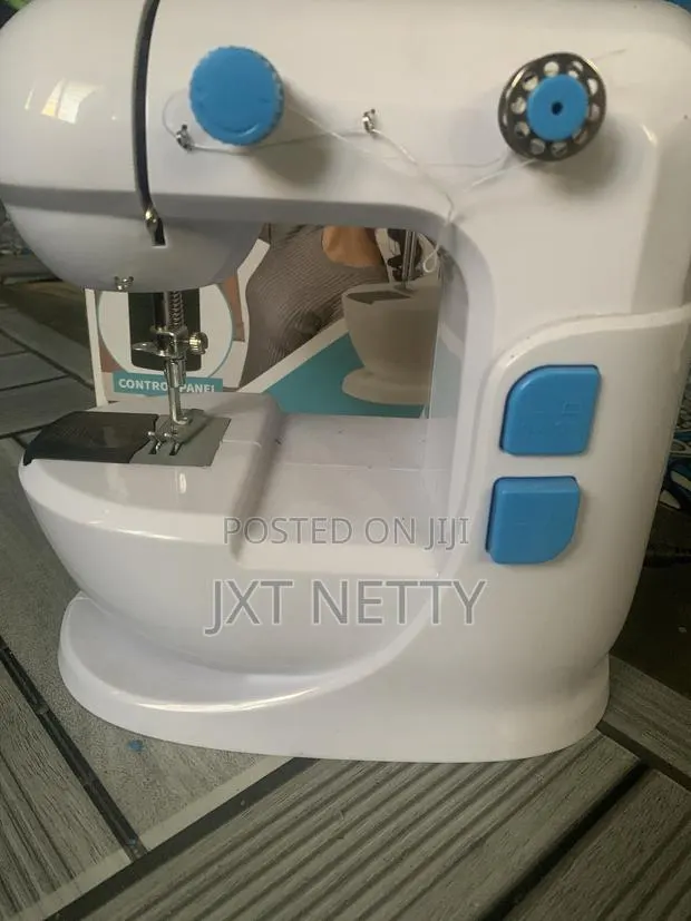 Portable Domestic Electric Sewing Machine · Photo 1
