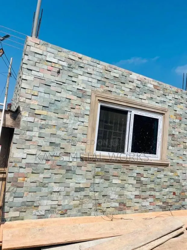 Natural Stone Wall Design | Wall Cladding Finishing · Photo 1