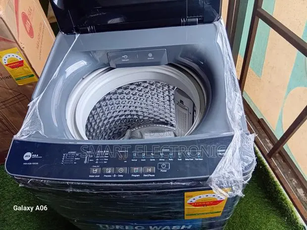 Elegant Black Top Load Washing Machine · Photo 1