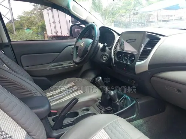 Mitsubishi L200 2018 White · Photo 1