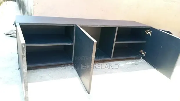 Slightly Used TV Stand · Photo 1