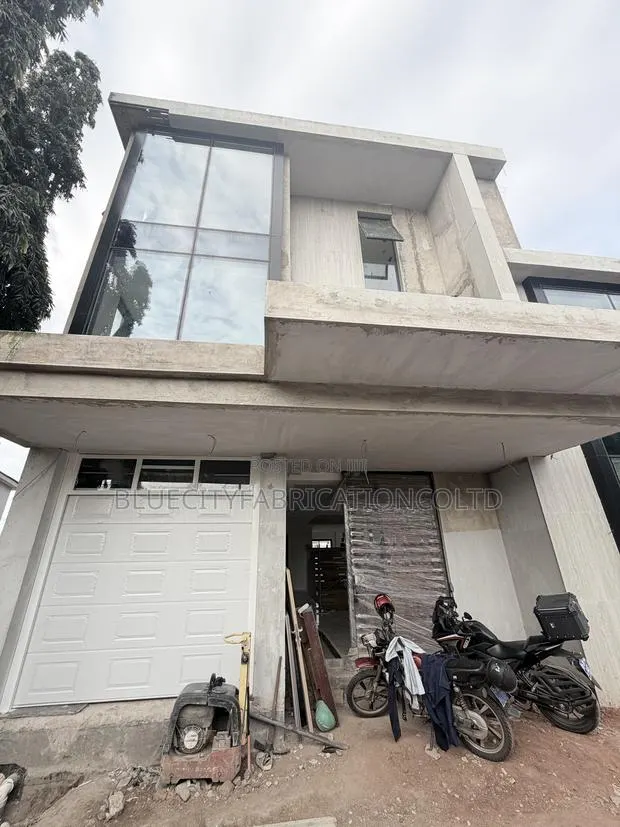 Smart Extended Fanlight Garage Door · Photo 1