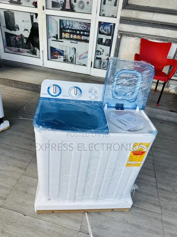 Ultra Modern Sleek White 10kg Topload Twintub. Nasco · Photo 1