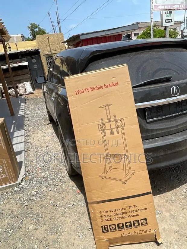 Adjustable Floor Tv Mount For 32– 75inch Tvs · Photo 1