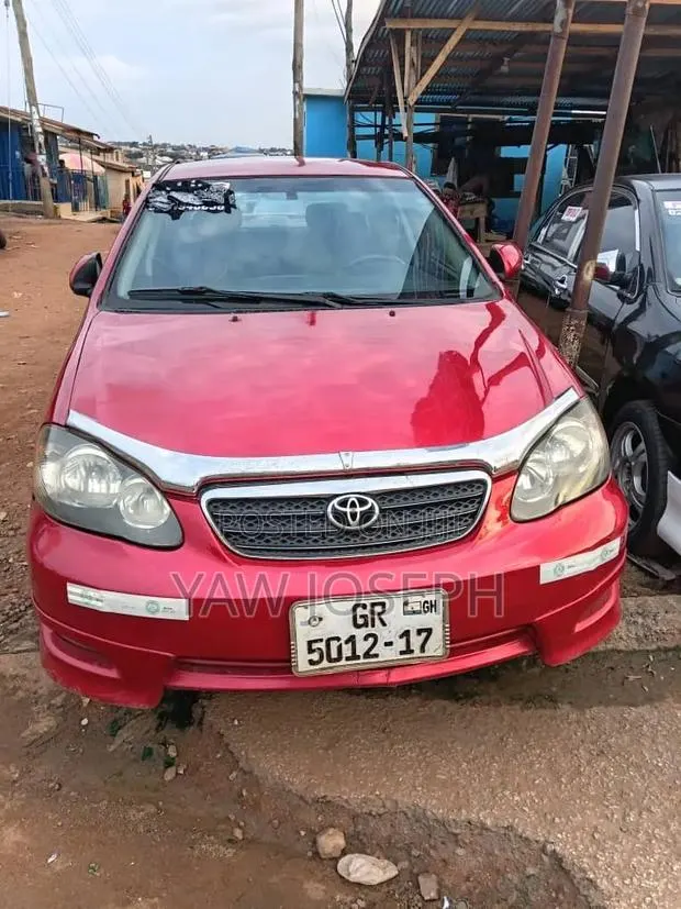 Toyota Corolla 2007 Red · Photo 1