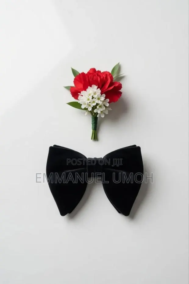 Classic Velvet Butterfly Bow Tie and Beautiful Groom's Boutonniere · Photo 1