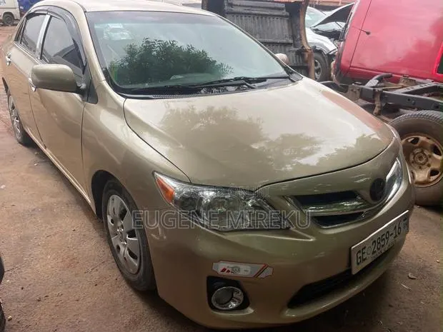 Toyota Corolla 2011 Burgundy · Photo 1