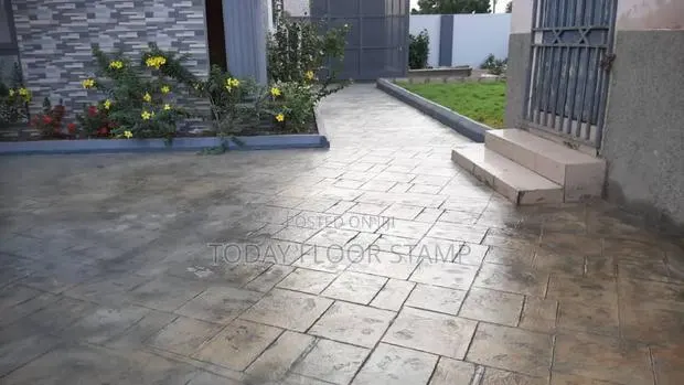 Concrete Stamp With Green Grass · Photo 1