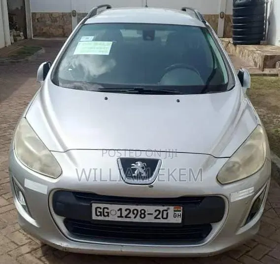 Peugeot 308 Estate 1.4 2012 Silver · Photo 1