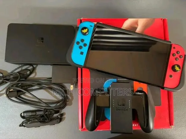 Nintendo Switch Oled With Games · Photo 1