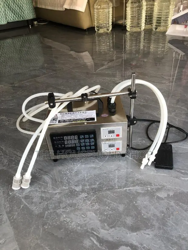 Double Nozzle Liquid Filling Machine · Photo 1