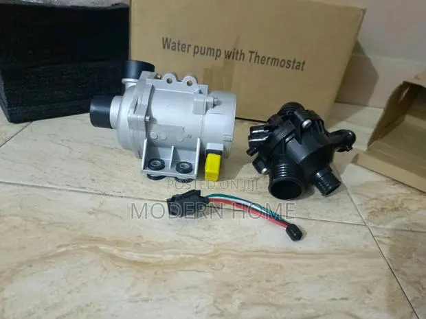 BMW 2.0L Water Pump With Thermostat · Photo 1