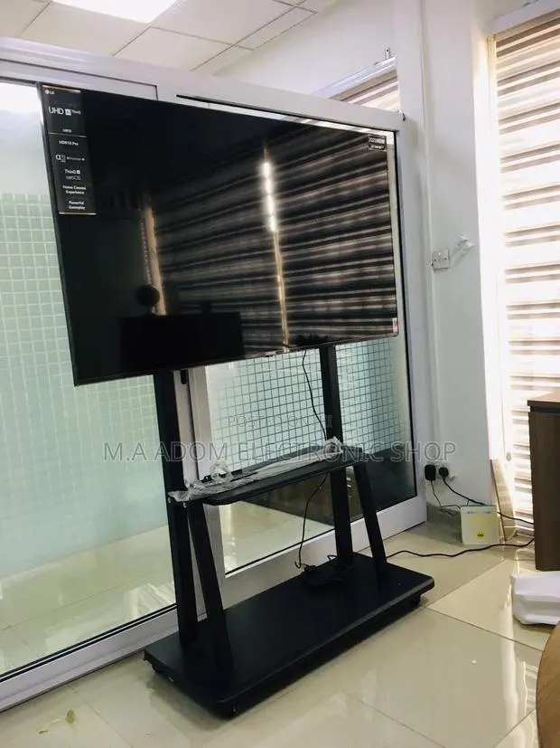 Mobile TV Cart 70"-100" - Heavy Duty · Photo 1