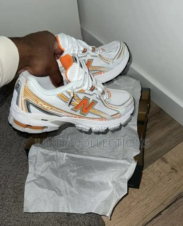 New Balance 740 Og Orange White · Photo 1
