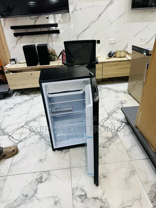 Newly in Box Table Top Black 92l Fridge Nasco · Photo 1