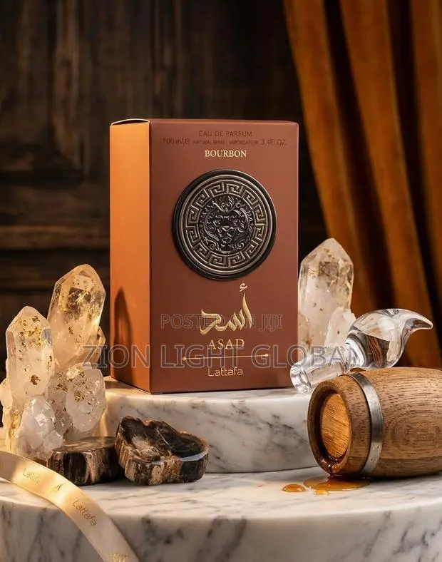 Lattafa Asad Bourbon (100ml)Lattafa Yara (100ml) · Photo 1