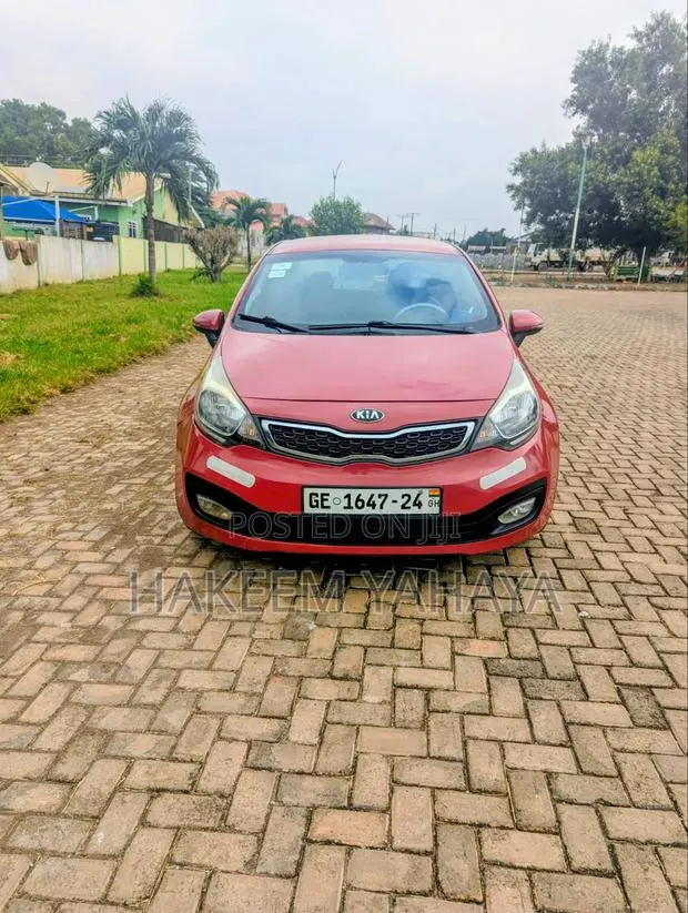 Kia Rio 2014 Burgundy · Photo 1