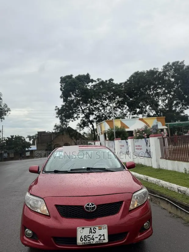 Toyota Corolla 2010 Red · Photo 1