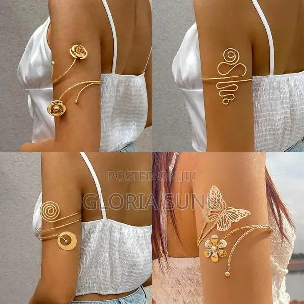 Gold Arm Cuffs · Photo 1