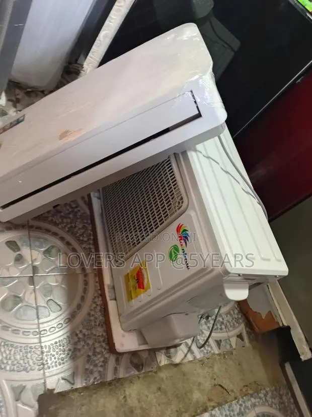 Rainbow 1.5hp Ultra Cool White Window Air Conditioner. · Photo 1