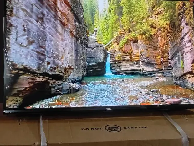 TCL 32” Television With Immersive Sound System · Photo 1