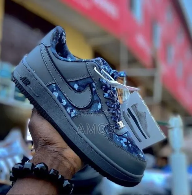 Nike Air Force 1 Camo Sneakers · Photo 1