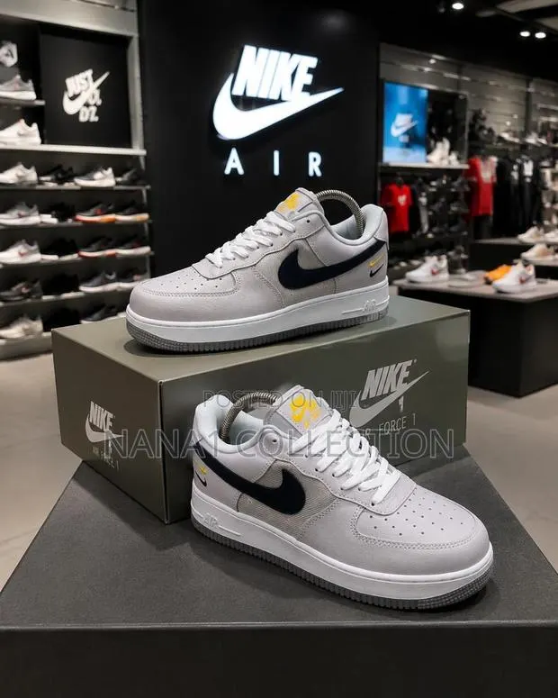 Nike Air Force Low “Wolf Grey Black University Gold” · Photo 1
