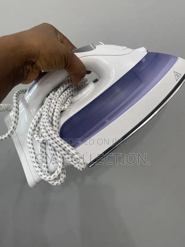 Steam Iron - Powerful Steam - Super Neat - Foreign Used · Photo 1