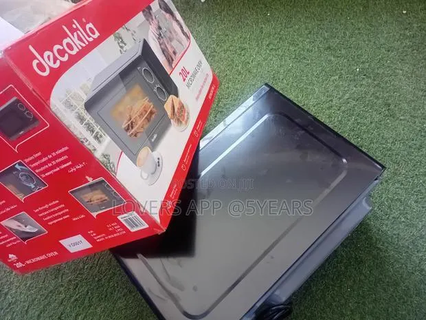 Efficient Decakila Microwave Oven for Quick Food Heating · Photo 1