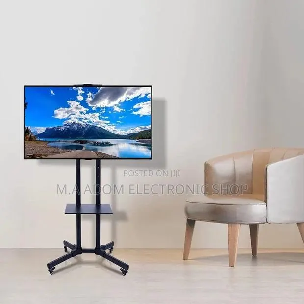 Modern Free Standing Tv Stand With Wheels 32”-70” · Photo 1