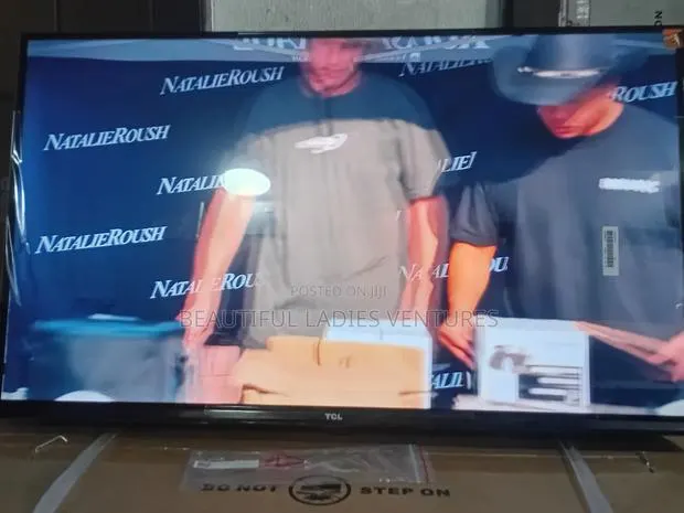 TCL 32” Modern Hd Television · Photo 1