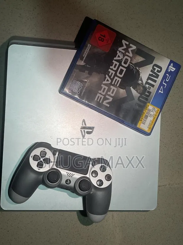 PS4 Slim New With 1pad N CD Game · Photo 1