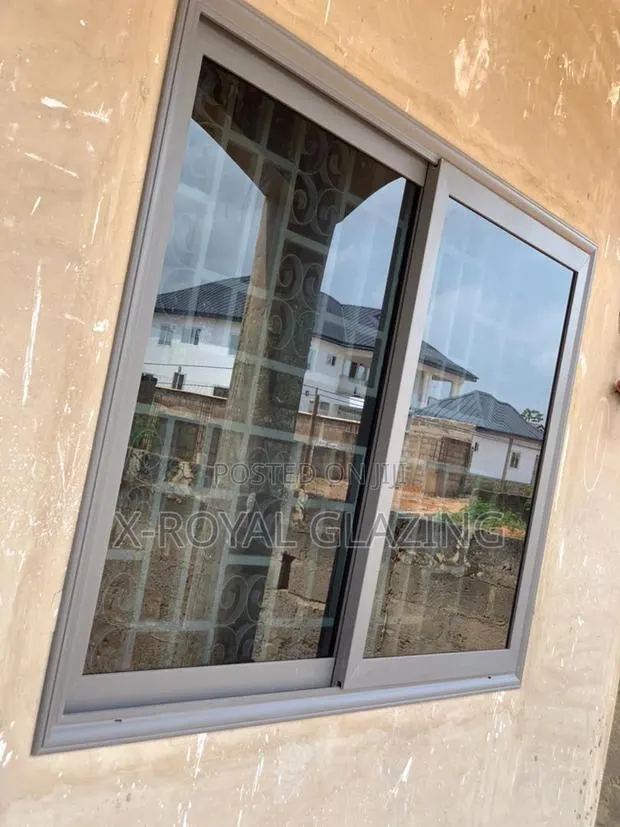 Grey Coated Single Glazed Italian Sliding Windows · Photo 1
