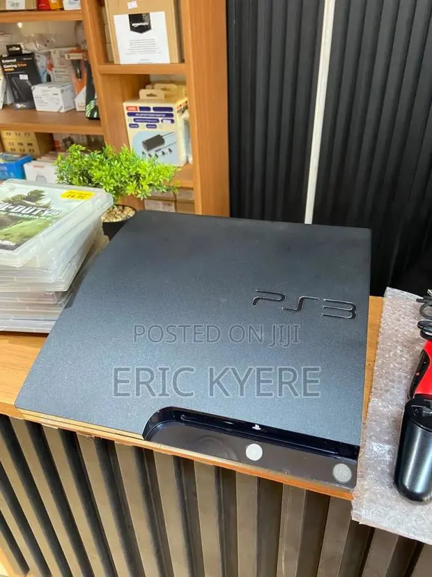 Sony PlayStation 3 (PS3) Slim · Photo 1