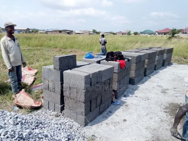 Block Cutting Team and Construction Work · Photo 1