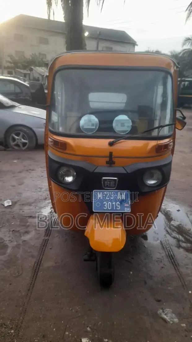 Bajaj RE 2023 Yellow · Photo 1