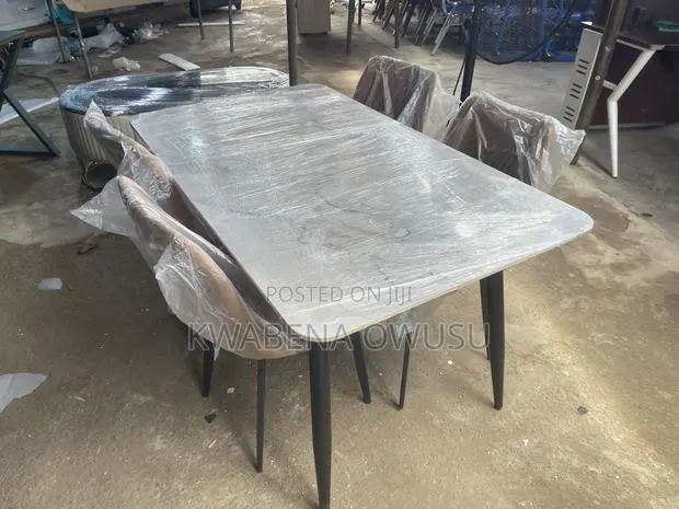 Dining Table With Four Chairs · Photo 1