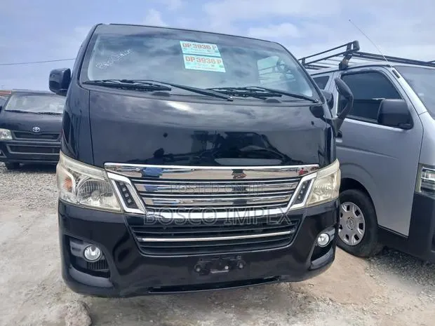 Nissan Caravan (Urvan) 2015 Brown · Photo 1