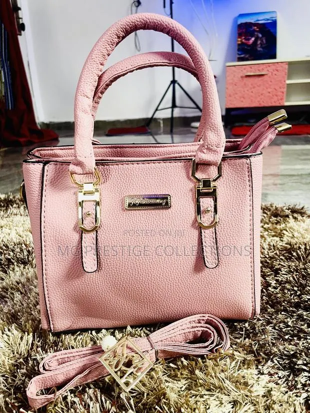 Elegant Blush Pink Top-Handle Satchel Bag With Strap · Photo 1