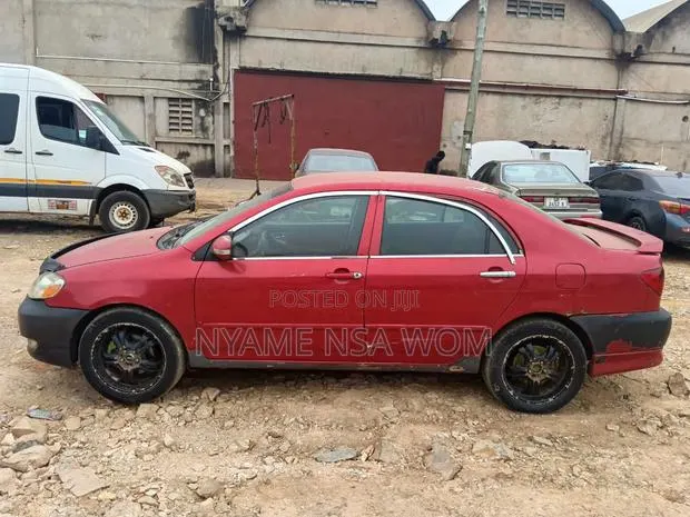 Toyota Corolla 2006 Red · Photo 1