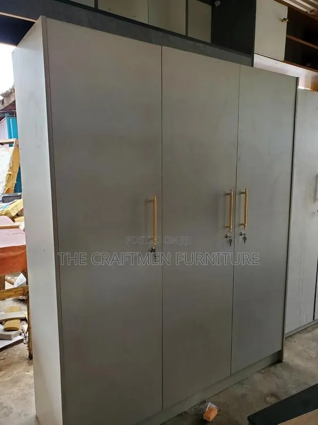 Foreign Wood Laminated 3 Doors Wardrobe. · Photo 1