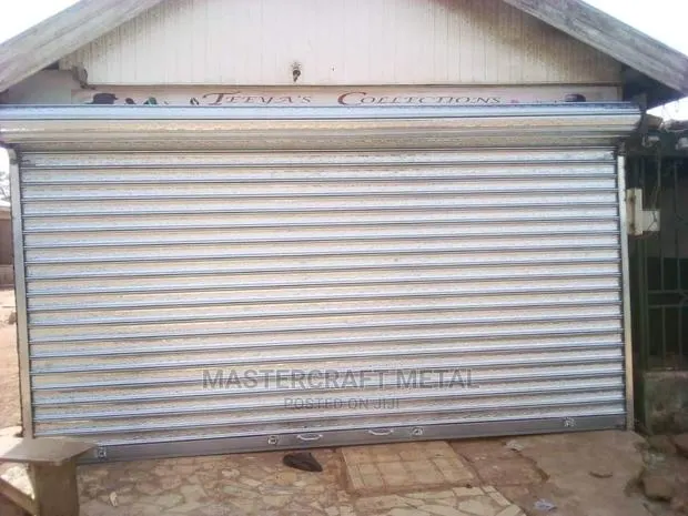 Galvanized Rolling Shutters/ Rolling Shutter /Garage Doors · Photo 1