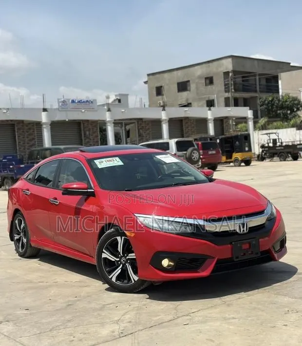 Honda Civic Touring 2dr Coupe (1.5L 4cyl) 2017 Red · Photo 1