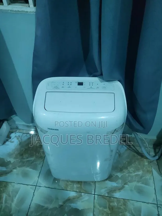 Toshiba Portable Ac 1.5 · Photo 1