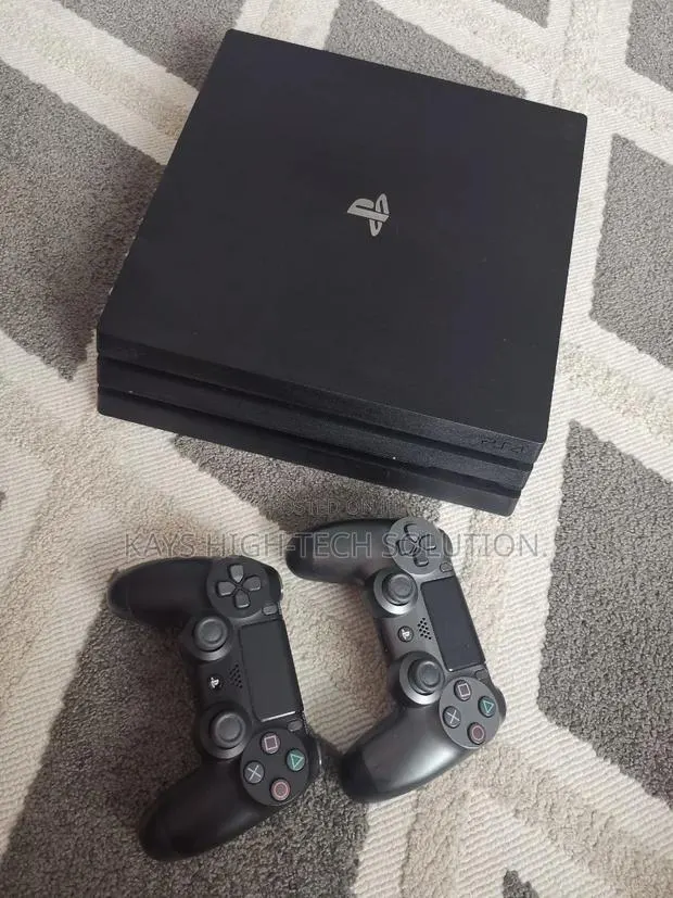 Playstation 4 Pro With 2 Controllers and Hot Big Games · Photo 1