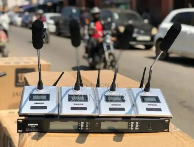 Shure 4-in-1 Wireless Conference Microphone System. · Photo 1