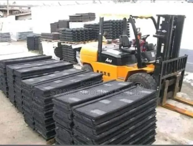 Quality Euro Roofing Sheets ( Black Shingles) · Photo 1