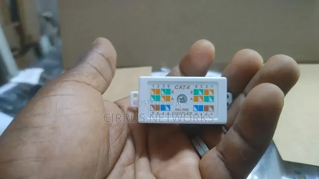 RJ45 Punch Down Ethernet Coupler · Photo 1